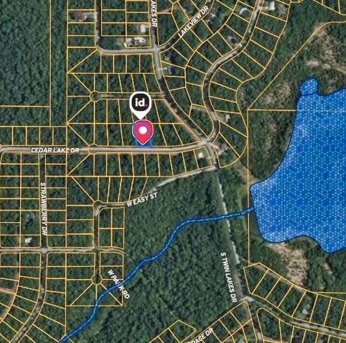 Decorative background for Peace of Mind Made Affordable – 0.41-Acre Wooded Lot One Block from Cedar Glade Lake image 9