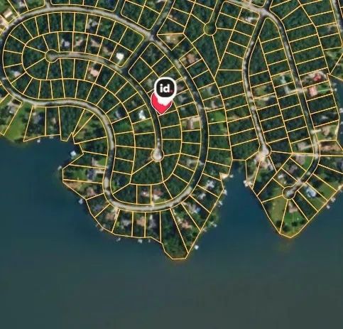 Decorative background for A Comfortable Place to Settle Down – Level Wooded Lot in North Shore, Surrounded by Crown Lake image 9