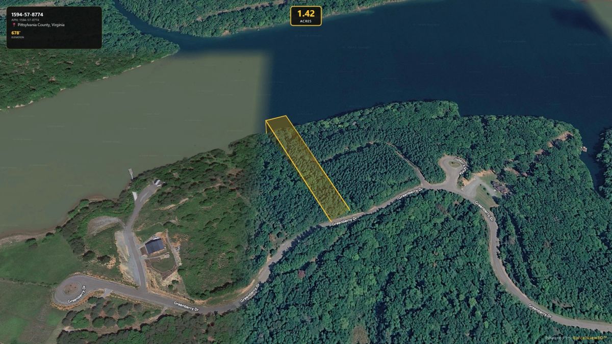 Vacant lot with paved road frontage, serene lake access and resort style amenities - Main image