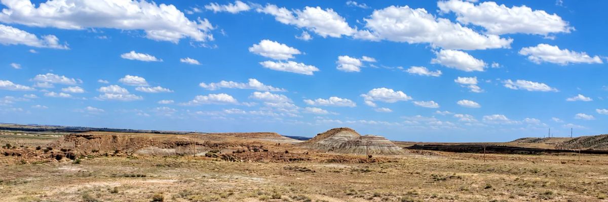 Decorative background for 519 Acres in Bridgeland, Utah-Road Access & Incredible Views! Bridgeland Utah with multiple road access points, dramatic desert scenery, rolling terrain, and expansive mountain views. image 6