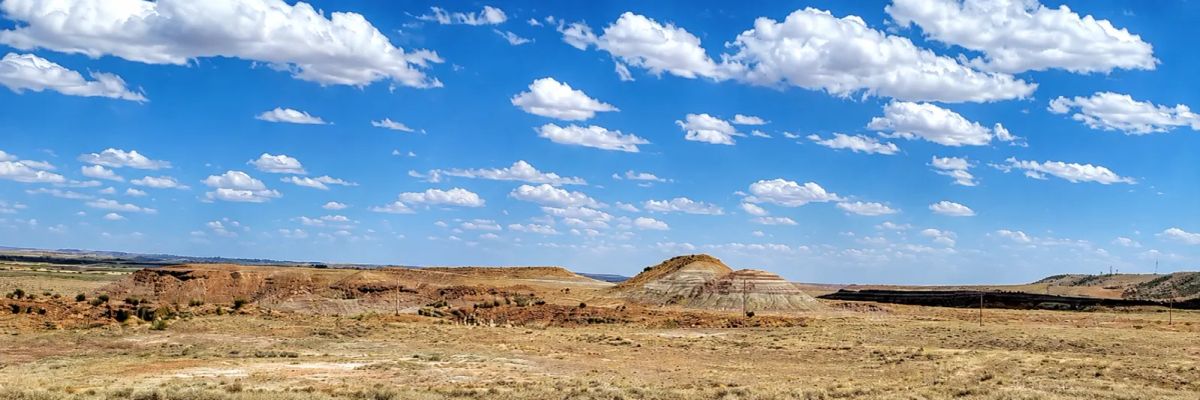 Decorative background for 519 Acres in Bridgeland, Utah-Road Access & Incredible Views! Bridgeland Utah with multiple road access points, dramatic desert scenery, rolling terrain, and expansive mountain views. image 9