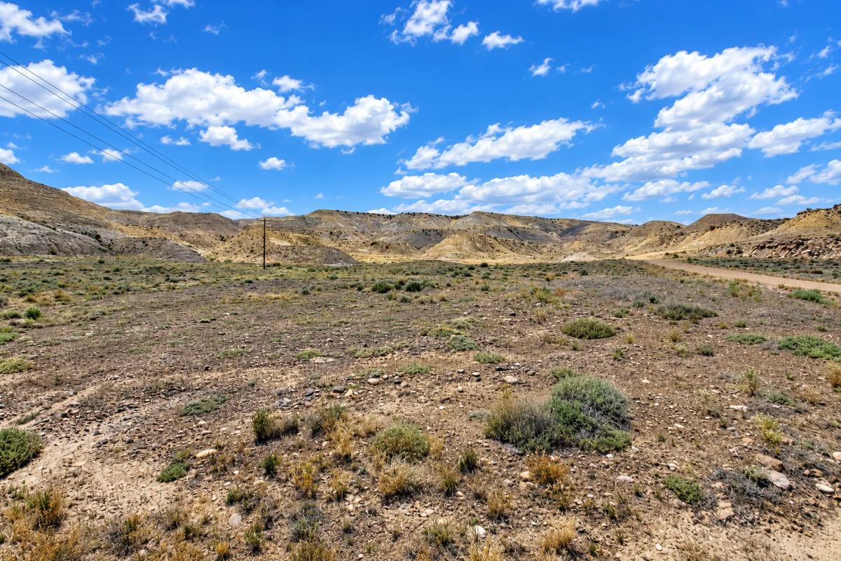 Decorative background for 519 Acres in Bridgeland, Utah-Road Access & Incredible Views! Bridgeland Utah with multiple road access points, dramatic desert scenery, rolling terrain, and expansive mountain views. image 13
