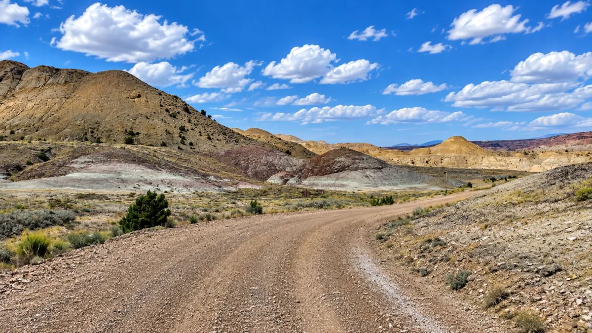 Decorative background for 519 Acres in Bridgeland, Utah-Road Access & Incredible Views! Bridgeland Utah with multiple road access points, dramatic desert scenery, rolling terrain, and expansive mountain views. image 10