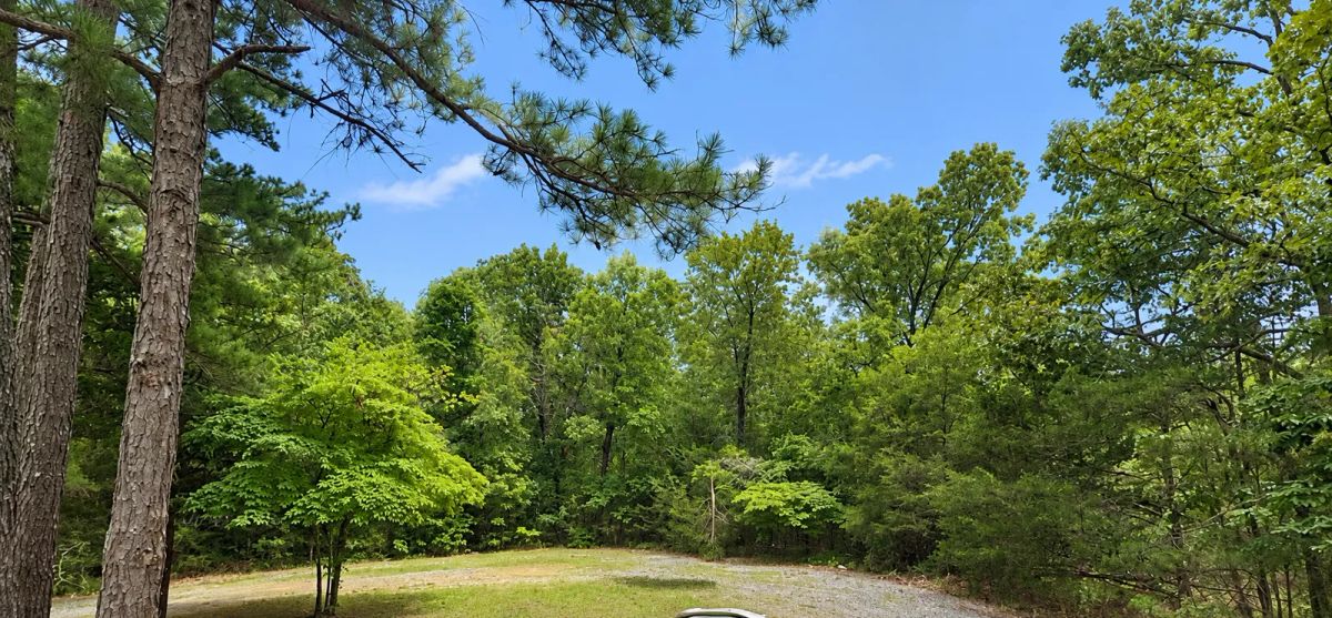 Decorative background for Discover a 16,358 Sq Ft Residential Property- Near Lake Aztec-Fulton County Arkansas -Road Frontage & Power APN : 305-17753-000 image 5