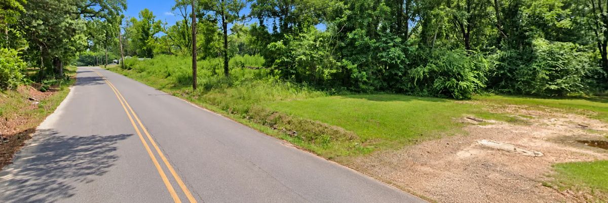 Decorative background for Great Residential Lot in Lafayette County, Arkansas, offers rural scenery, wooded hills, and outdoor recreation. image 5