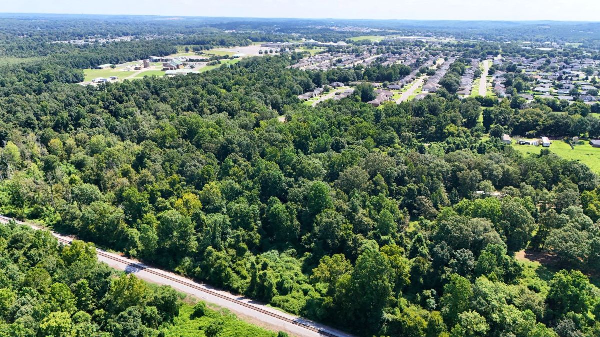 4.40 Wooded Acres Set in Tuscaloosa, Alabama with Creek, Utilities, & Safe Family Cul-de-Sac Living - Image 2