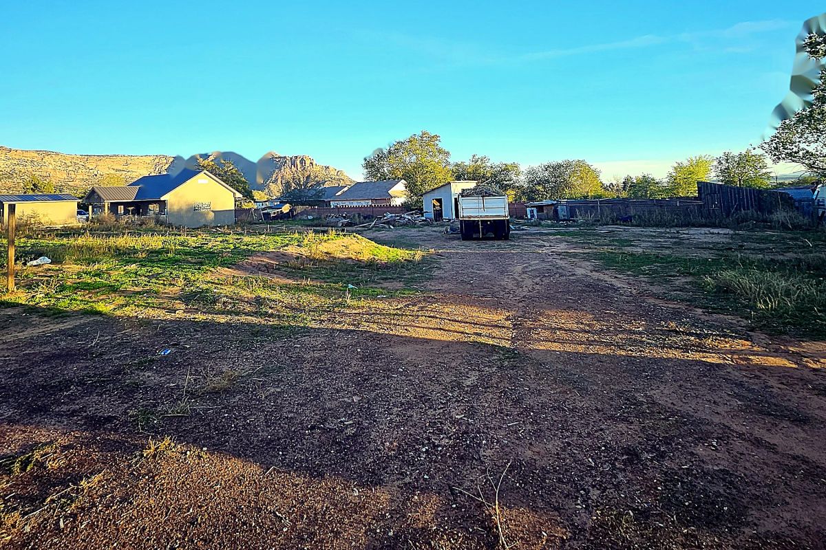 Decorative background for Red-Rock Views by BLM Land, .88 Acre Home, Seller Financing image 14