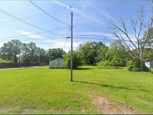 Decorative background for 0.1 Acres for Sale in Laurel, Mississippi image 10