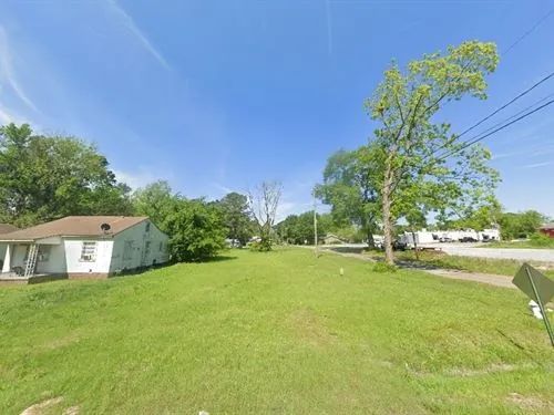Decorative background for 0.1 Acres for Sale in Laurel, Mississippi image 11