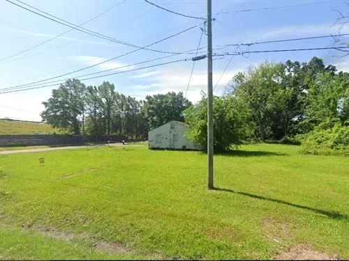 Decorative background for 0.1 Acres for Sale in Laurel, Mississippi image 14