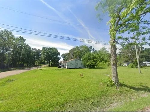 Decorative background for 0.1 Acres for Sale in Laurel, Mississippi image 16