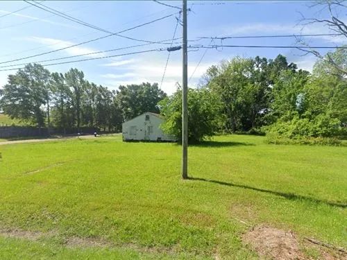 Decorative background for 0.1 Acres for Sale in Laurel, Mississippi image 18
