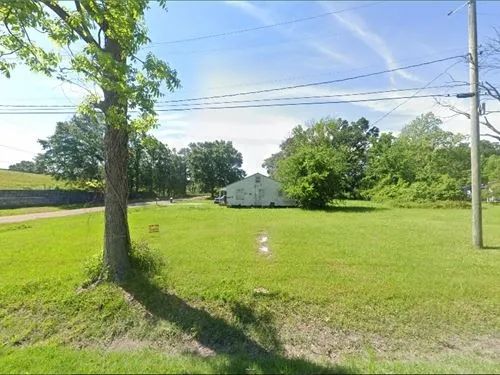 Decorative background for 0.1 Acres for Sale in Laurel, Mississippi image 19