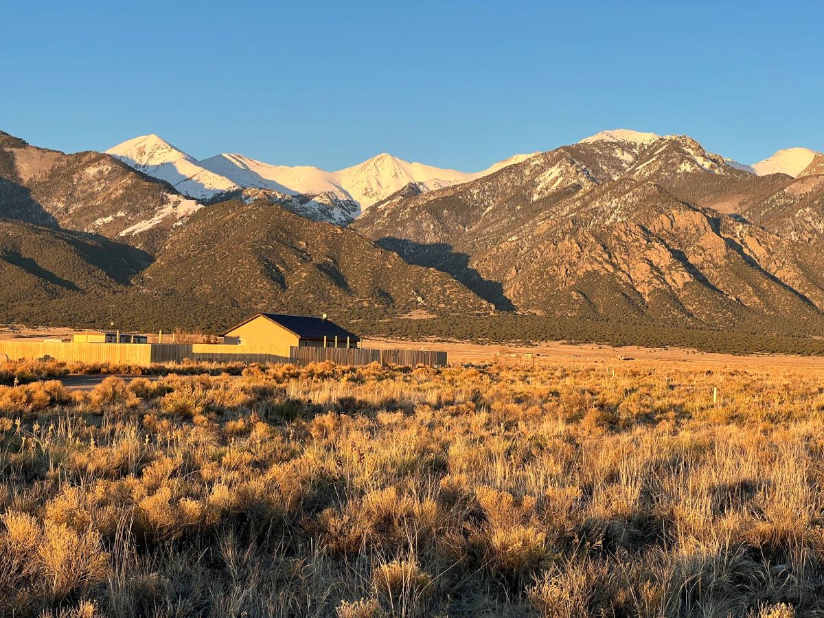 Flat Land Surrounded by Peaks - Image 2