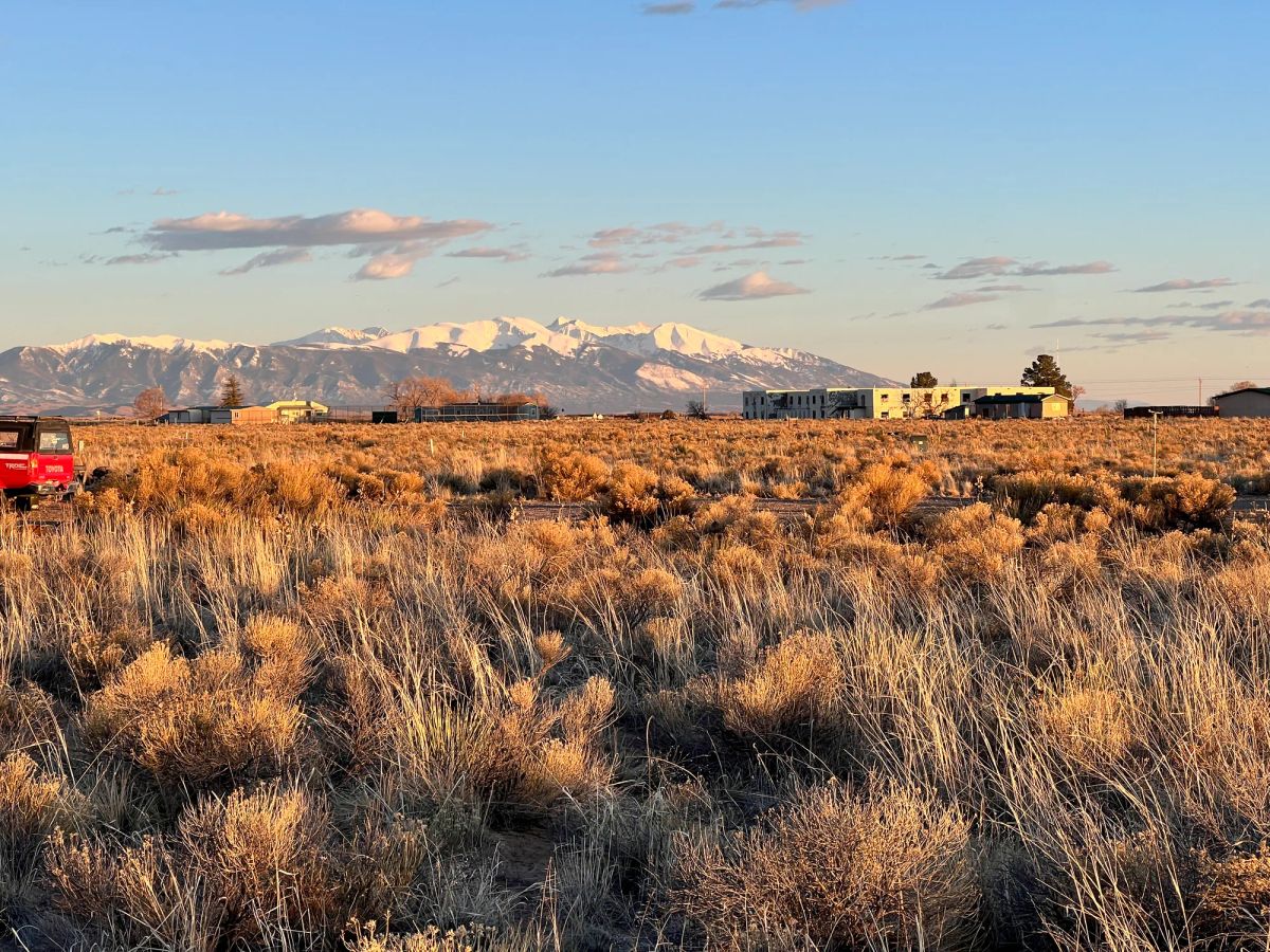 Flat Land Surrounded by Peaks - Image 3