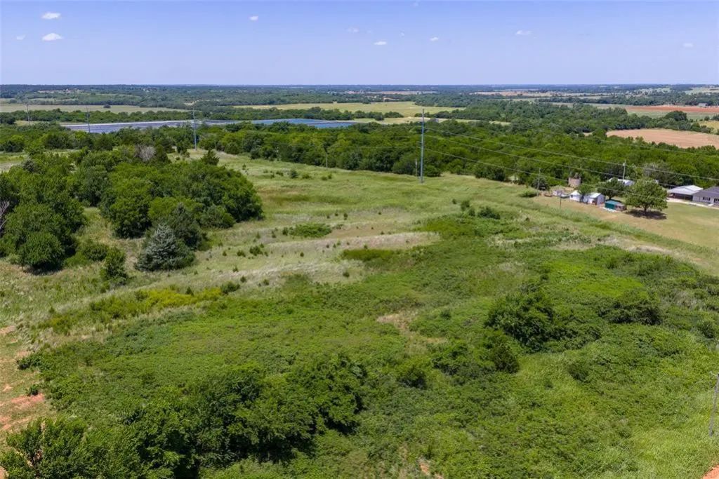 Decorative background for 46.75 Acres in Washington, OK - Pasture, Trees & Pond image 10