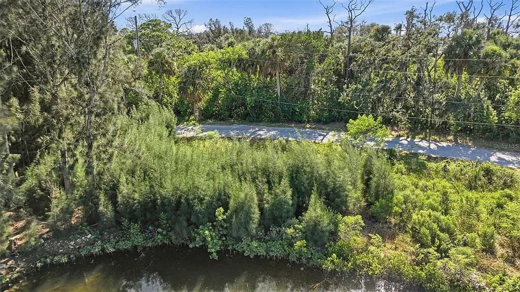 Decorative background for Waterfront Corner Residential Lot in Hudson, FL image 7