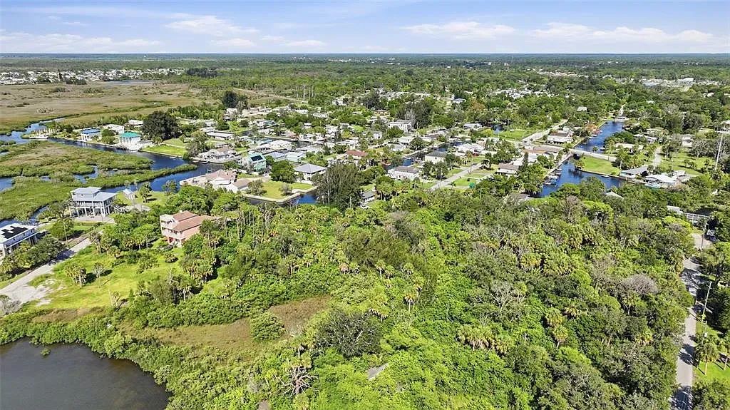 Decorative background for Waterfront Corner Residential Lot in Hudson, FL image 17