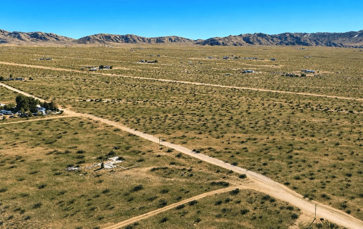 Decorative background for 9 Acres in Bell Mountain, CA – Mountain Views & Future Development Potential image 5