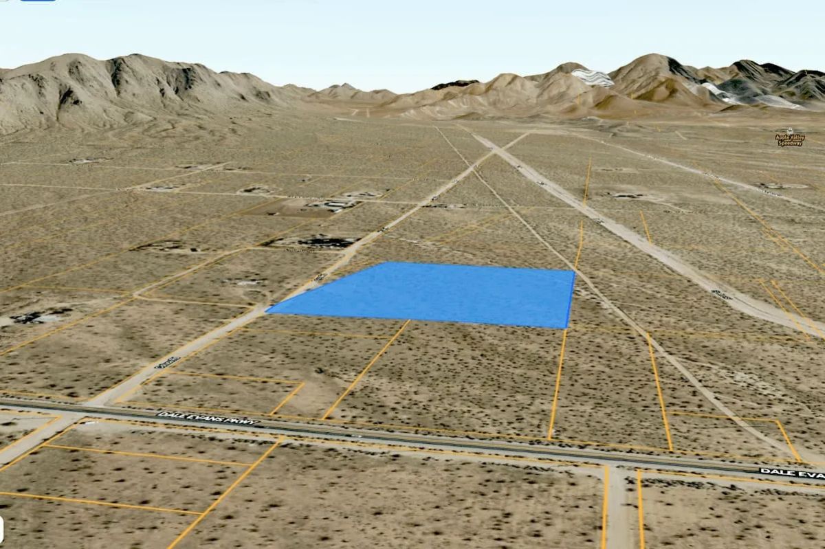 Decorative background for 9 Acres in Bell Mountain, CA – Mountain Views & Future Development Potential image 11