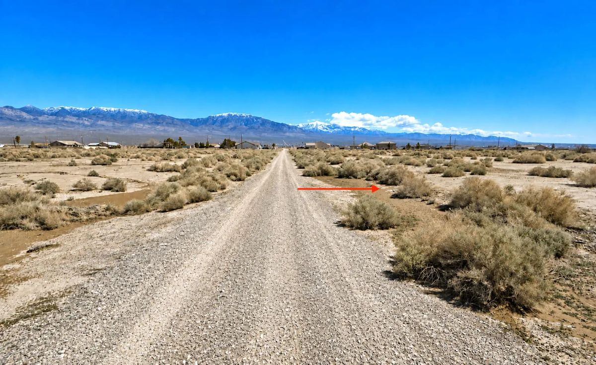 Decorative background for 0.23 Acres in North Pahrump, NV – Mountain Views & Easy Highway Access image 6